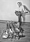 Gregg with guitars and shoes